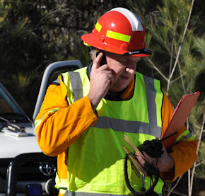 Picture of fire warden making a call