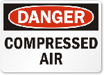 A 'Danger Compressed Air' sign.